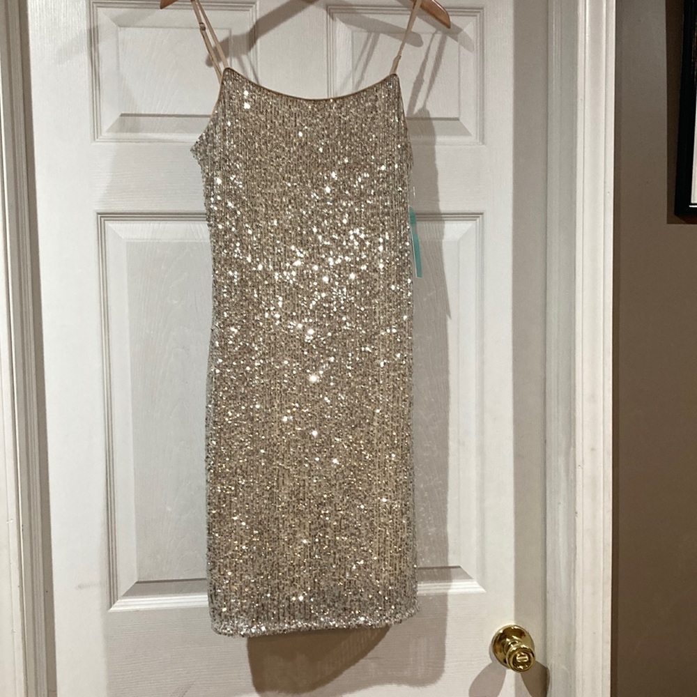 Sequined dress hits mid thigh, zips up back, lined, gold/cream color